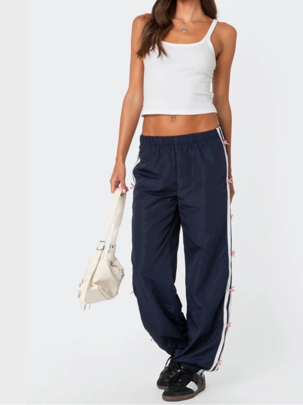 Edikted Bow Stripe Nylon Track Pants with pink bows, size S